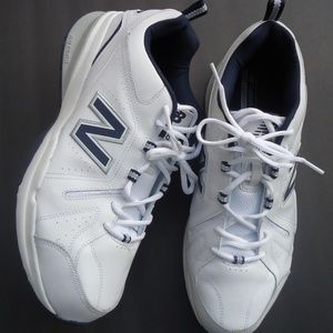SIZE 15 4E. New Balance men's white leather sneakers shoes.